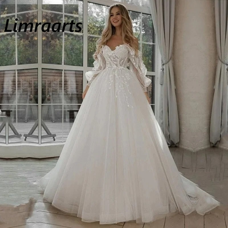 Customized Off Shoulder Lace Glitter Wedding Dresses 2026 Long Puff Sleeve 3D Flowers Boho Bride Gown